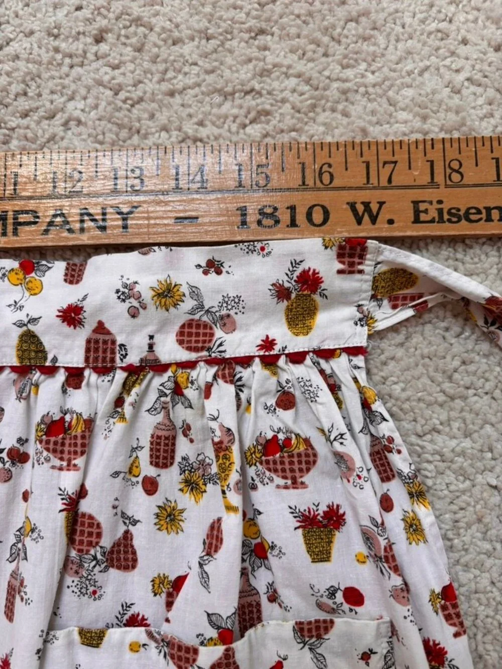 Vintage kitchen apron novelty fruit and floral pattern with red rick rack trim